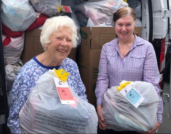 Marilyn and Leslie with bags going to Camalu.