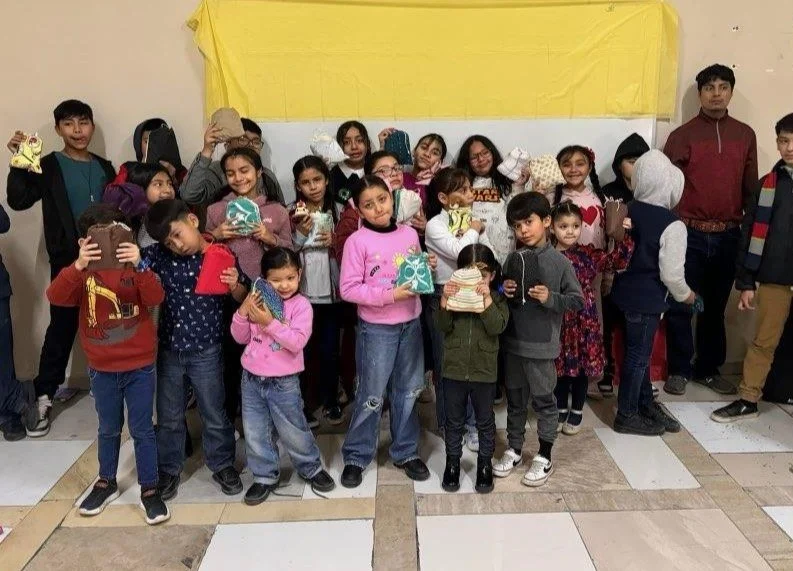 Children with our bags at Pastor Veronica's  camp